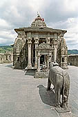 Baijnath Temple - a life sized stone Nandi guard the temple entrance. 